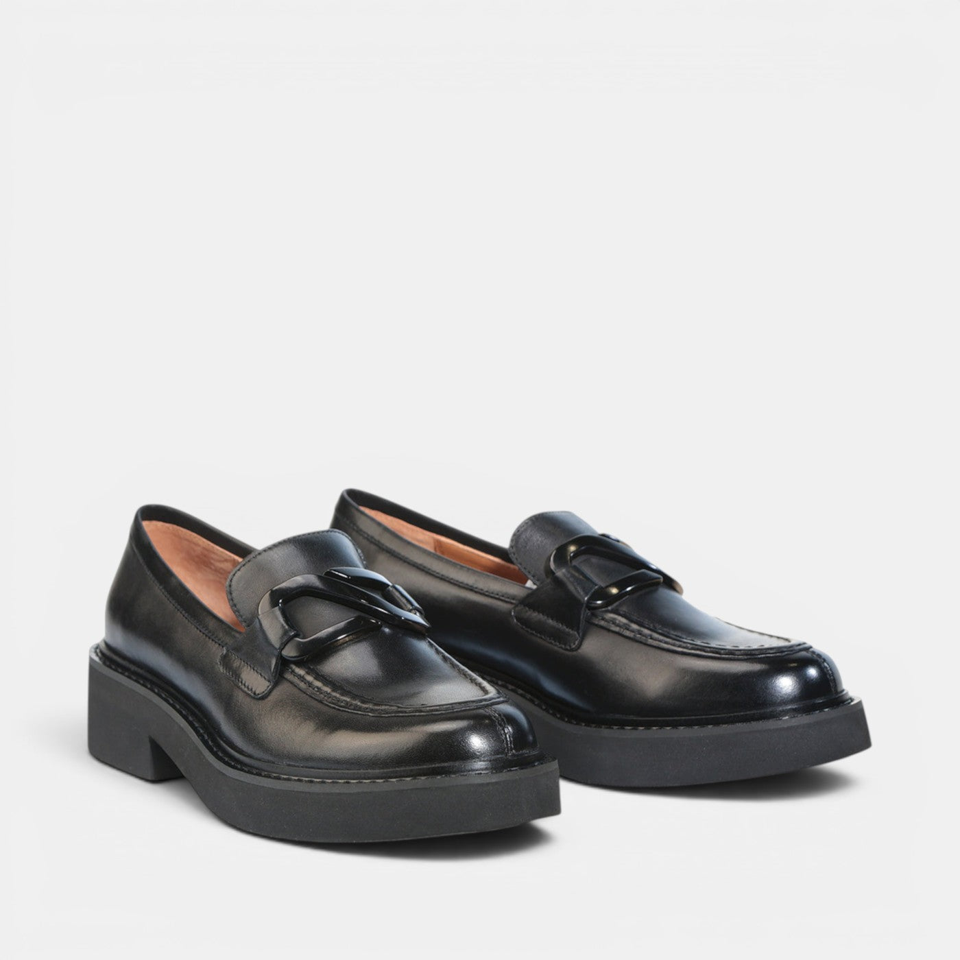 EOS Leia black loafers for women, featuring sleek leather design and comfortable slip-on style, displayed on a plain background.