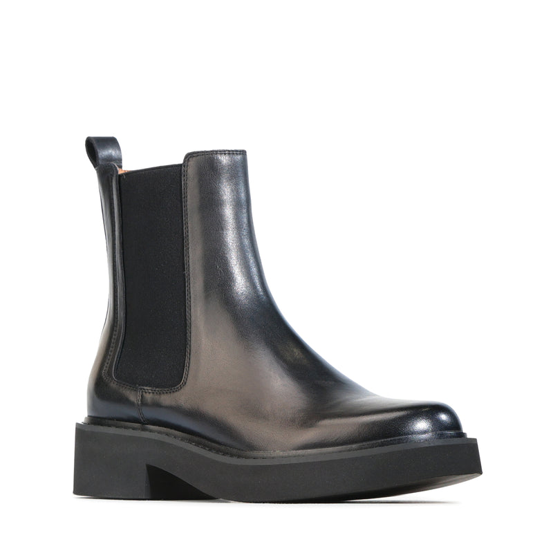 EOS LEILN black boots featuring sleek leather design and stylish ankle height, perfect for versatile fashion looks.