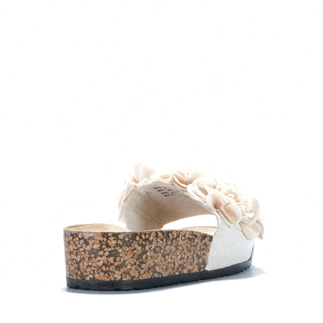 Natural Los Cabos Corsage slippers with soft, woven fabric and floral design, showcasing comfortable slip-on footwear.