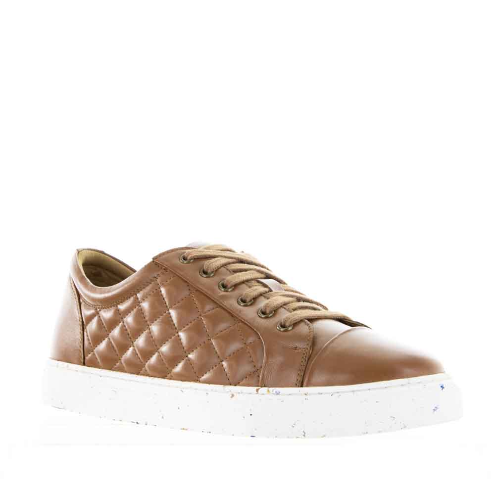 Le Sansa Manda Tan sneakers featuring a stylish tan leather design and casual lace-up style.