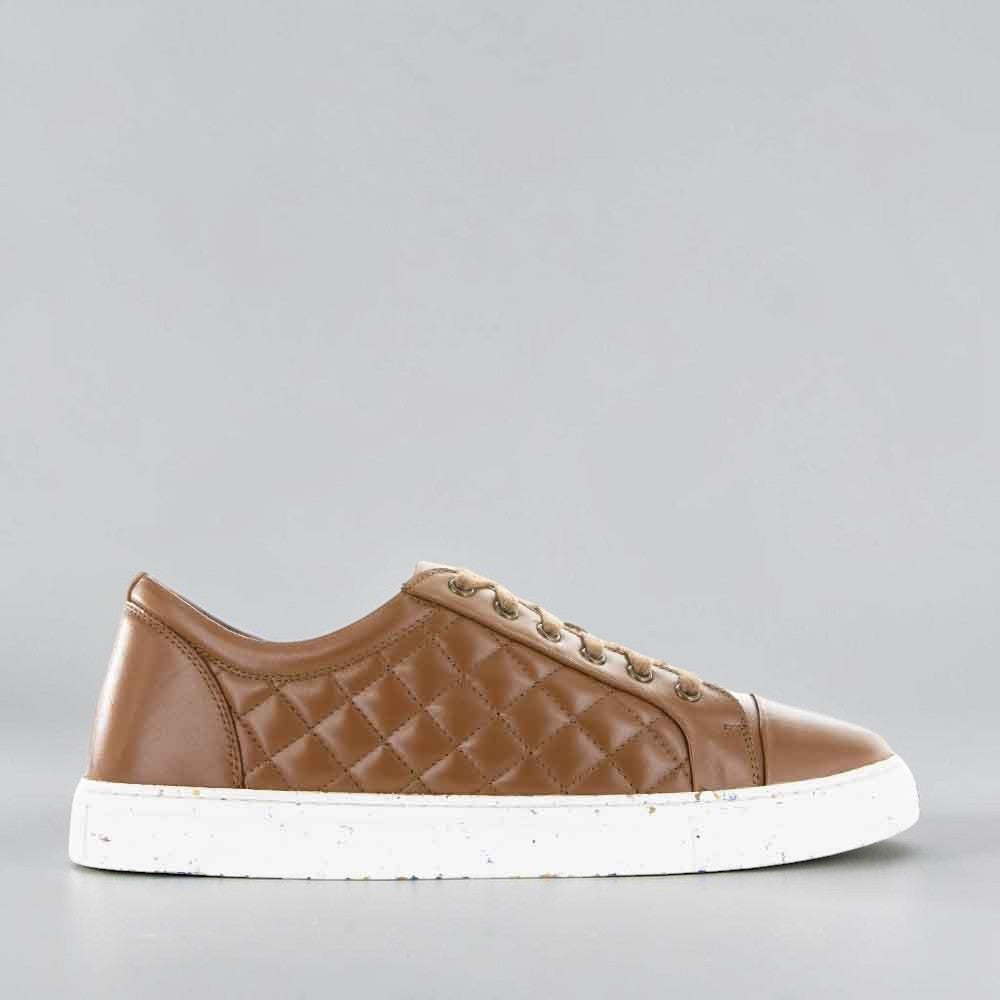 LE SANSA Manda Tan sneakers featuring sleek design and tan color, perfect for casual or athletic wear.