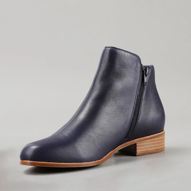 Le Sansa Murphy navy boots featuring a stylish design with navy color and southwestern pattern details.