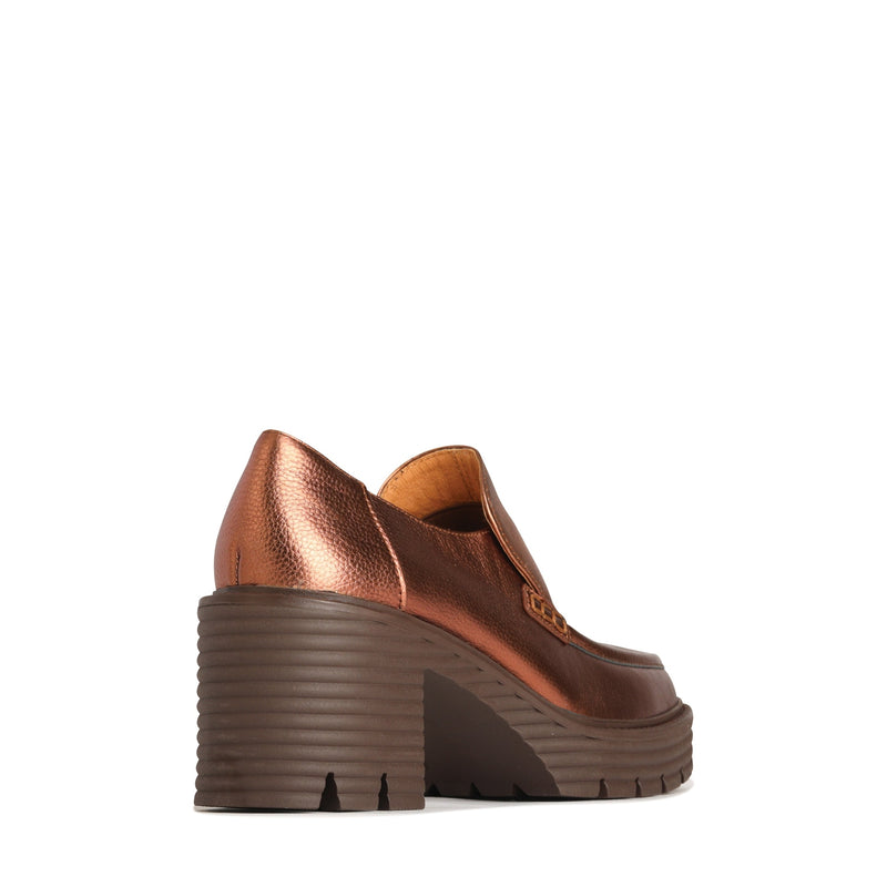 Rust metallic EOS Malia heels viewed from the back at an angle, showcasing the stylish design and elegant silhouette.