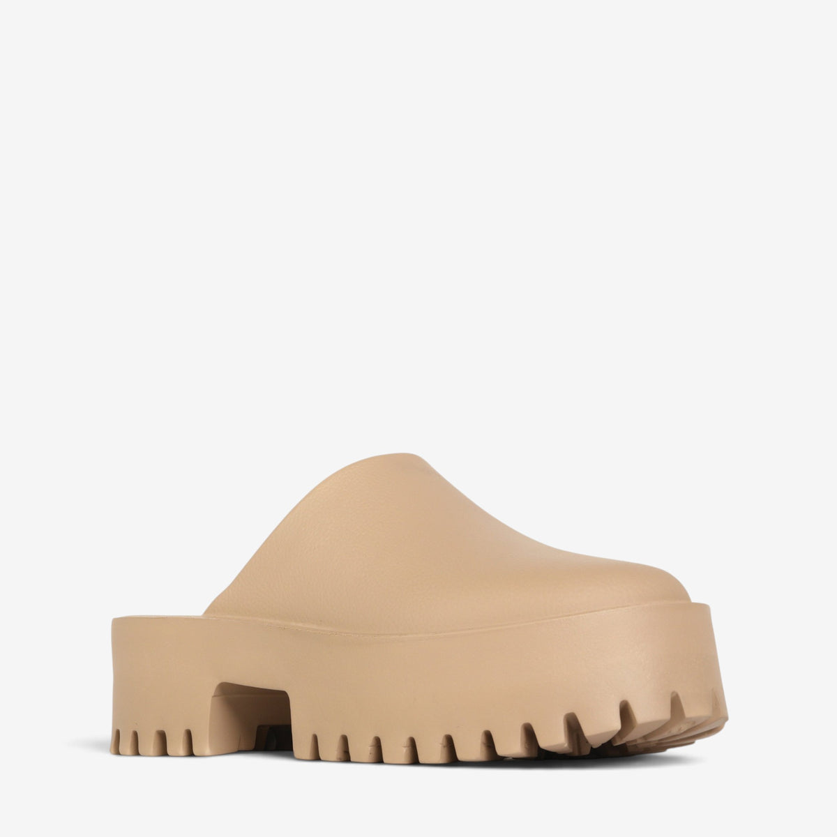 Los Cabos Marre taupe slip-on shoes shown from an angled view, featuring a sleek design and neutral taupe color.