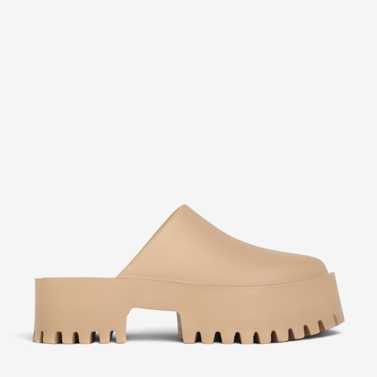 Los Cabos Marre taupe slip-on shoes shown outdoors, featuring a sleek design and neutral taupe color.