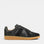 Black EOS Melbaa sneakers with sleek design and cushioned soles, featuring the EOS logo on the side.