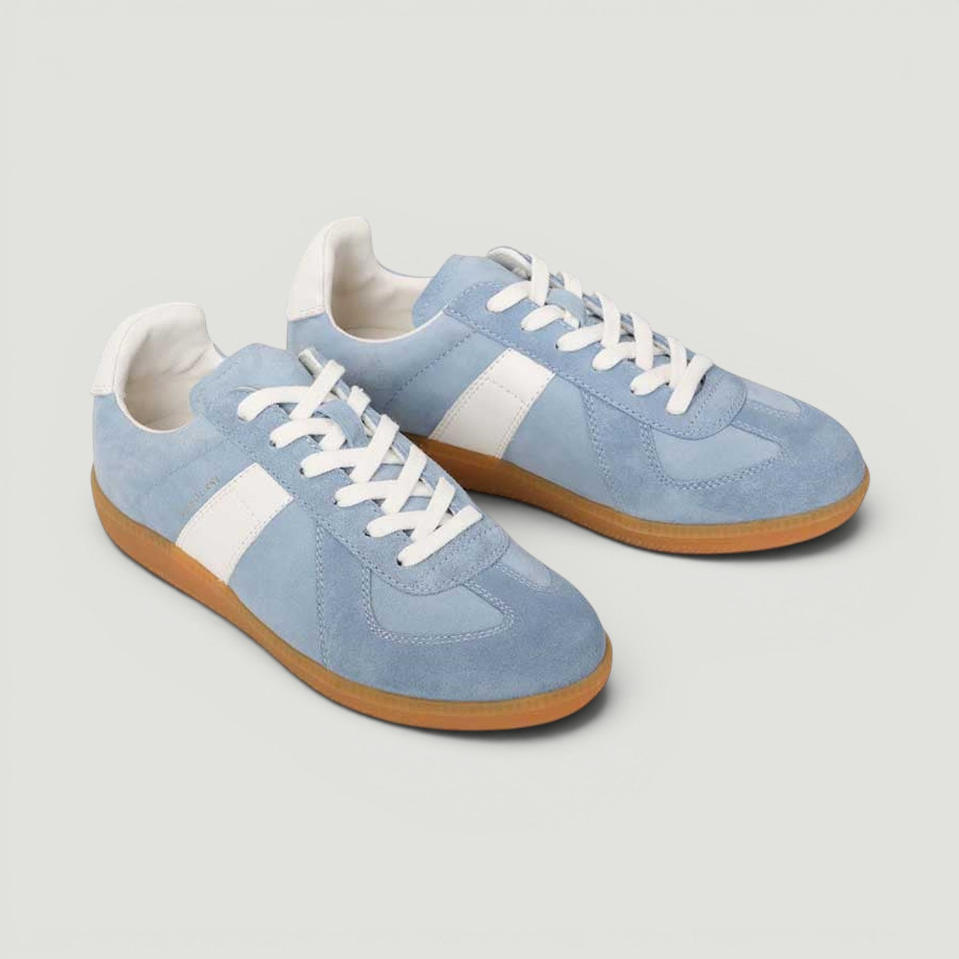 EOS Melbaa Sky sneakers in cool blue with stylish design, featuring a comfortable fit and modern athletic style.