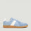 EOS Melbaa Sky sneakers featuring a sleek design with sky-blue accents and comfortable casual footwear for everyday wear.