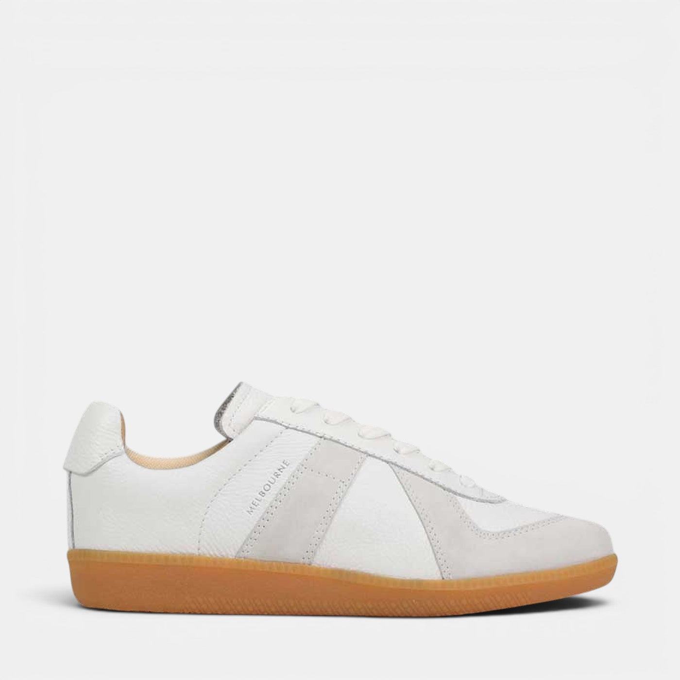 White EOS Melbaa sneakers with sleek design, showcasing the comfortable lacing and stylish look on a clean background.