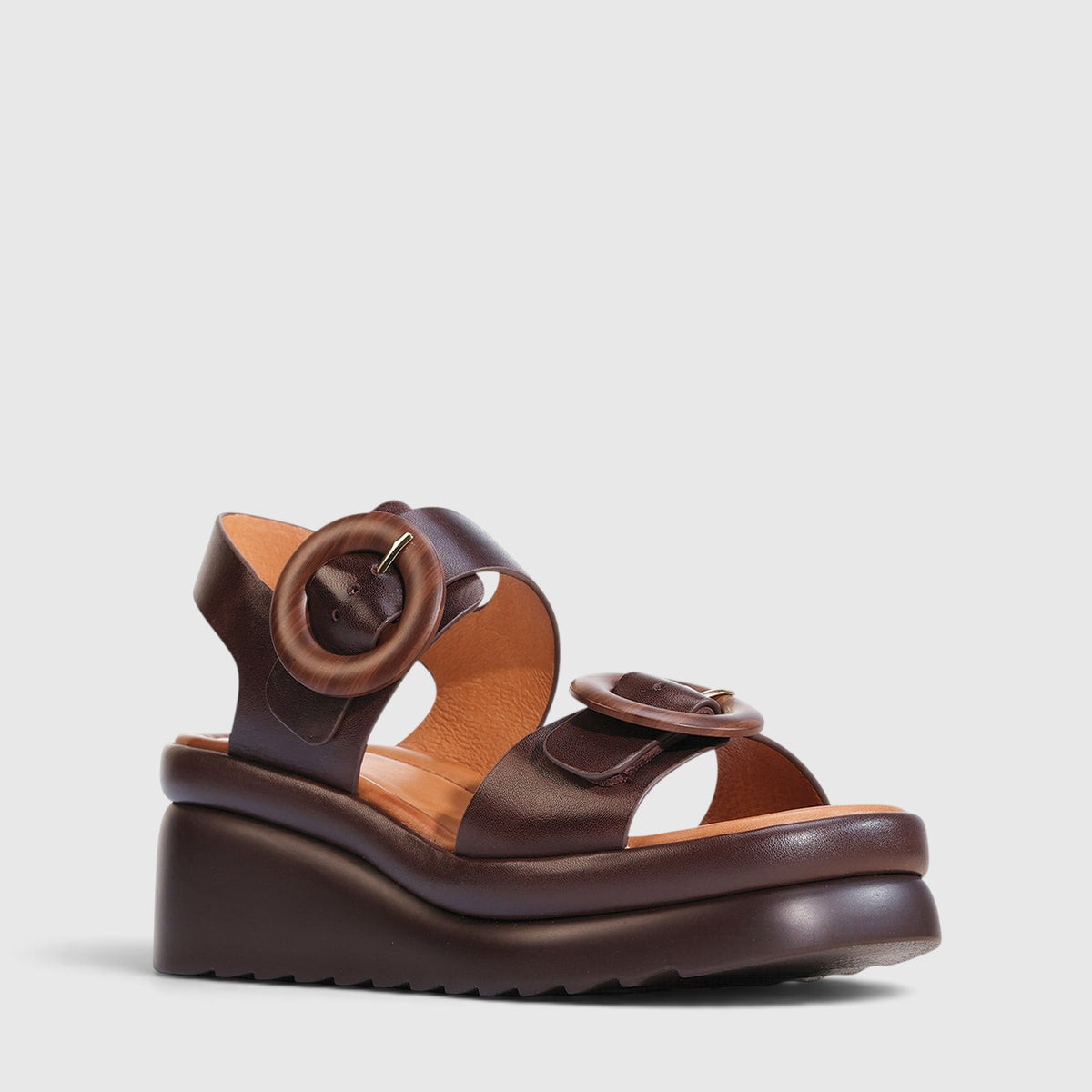 Eos Menorcas chestnut sandals with brown leather straps and open toe design, showcasing casual summer footwear.