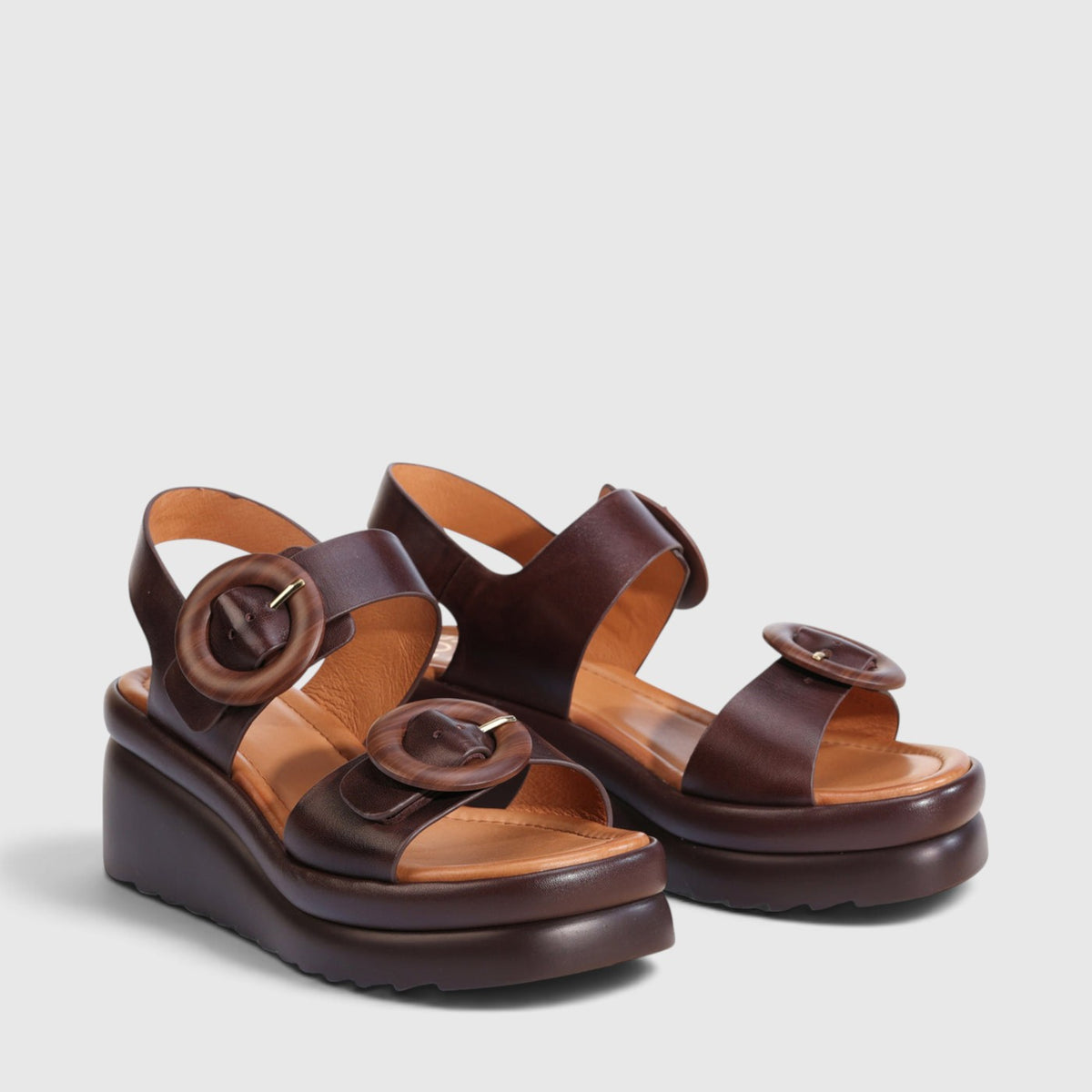 Eos Menorcas chestnut leather sandals with open toe and ankle strap, stylish footwear for casual wear.
