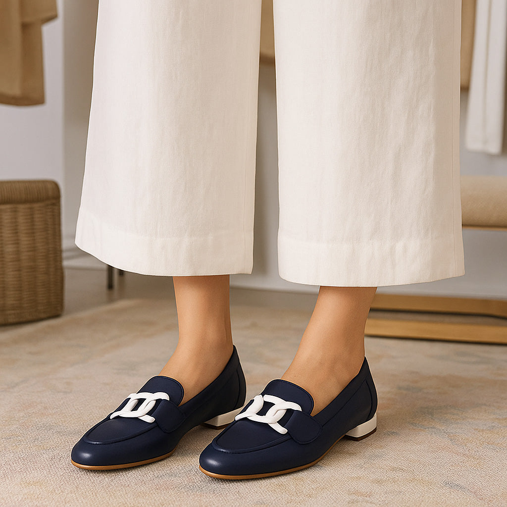 Naked Arches Japanese navy and white loafers with sleek design and stitching details, perfect for casual or smart-casual wear.