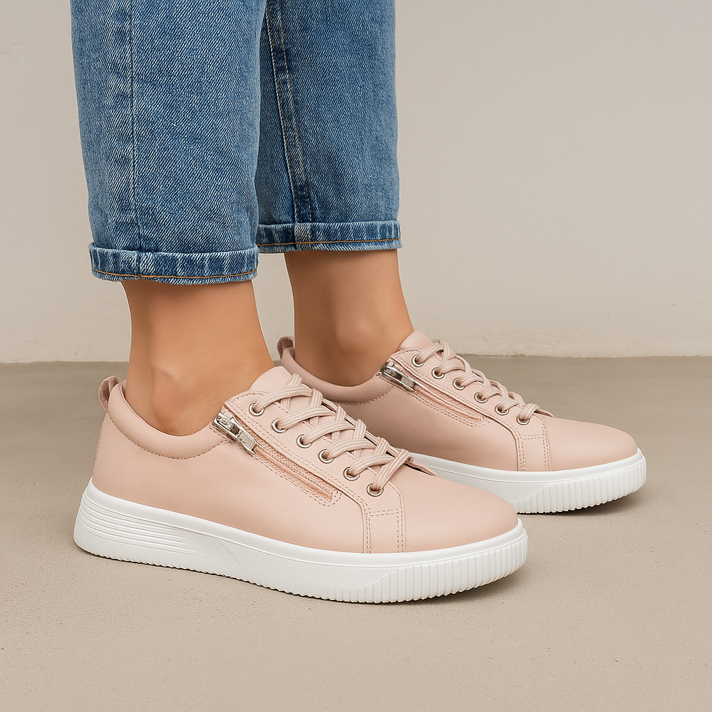 Naked Arches Nelly Blush sneakers in pink with white soles, featuring a stylish and comfortable casual design.
