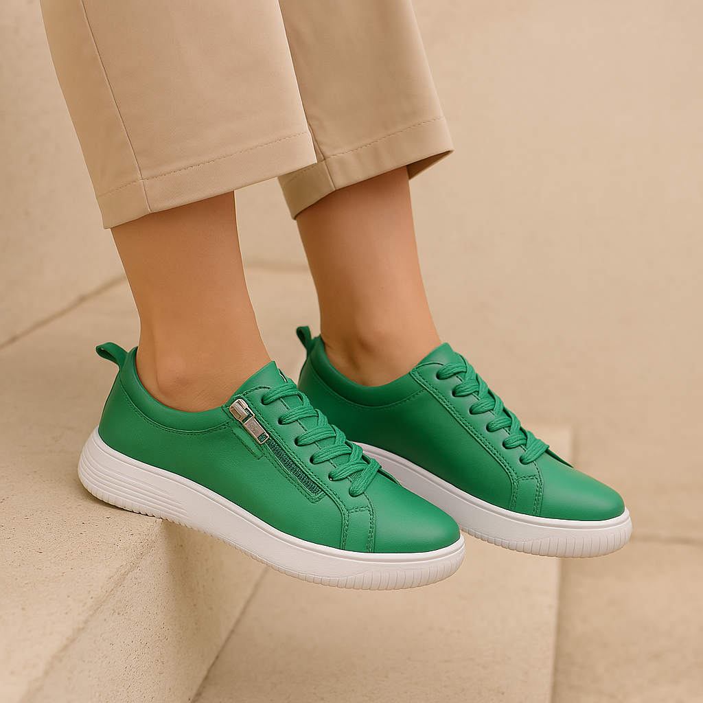 Naked Arches Nelly Jade sneakers with green and beige color blocking, featuring a comfortable casual design and lace-up closure.