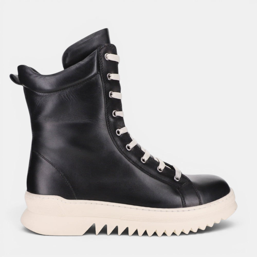 Black LE SANSA Naomi boots with side zipper and sleek design, shown from a side angle.