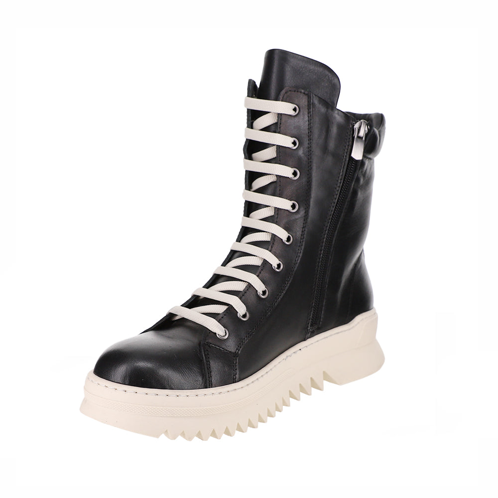 Black LE SANSA Naomi boots with southwestern accents, featuring stylish ankle-length design and textured details.