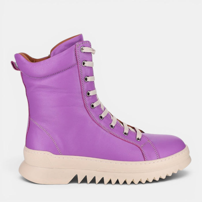 Le Sansa Naomi violet boots shown from the side, featuring stylish design and vibrant violet color.