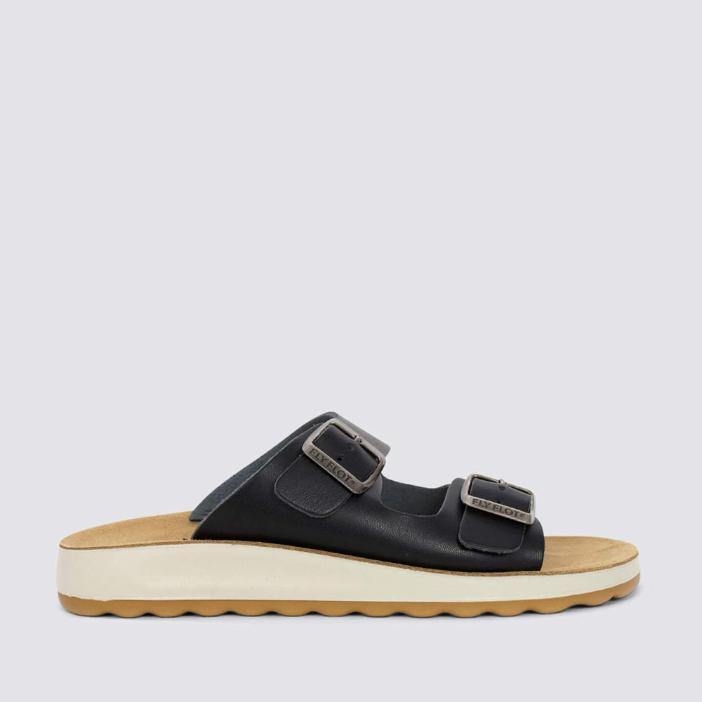 Black Fly Flot FLY FLOT 77G64 2C flats with open toe and slip-on design, shown on a neutral background.