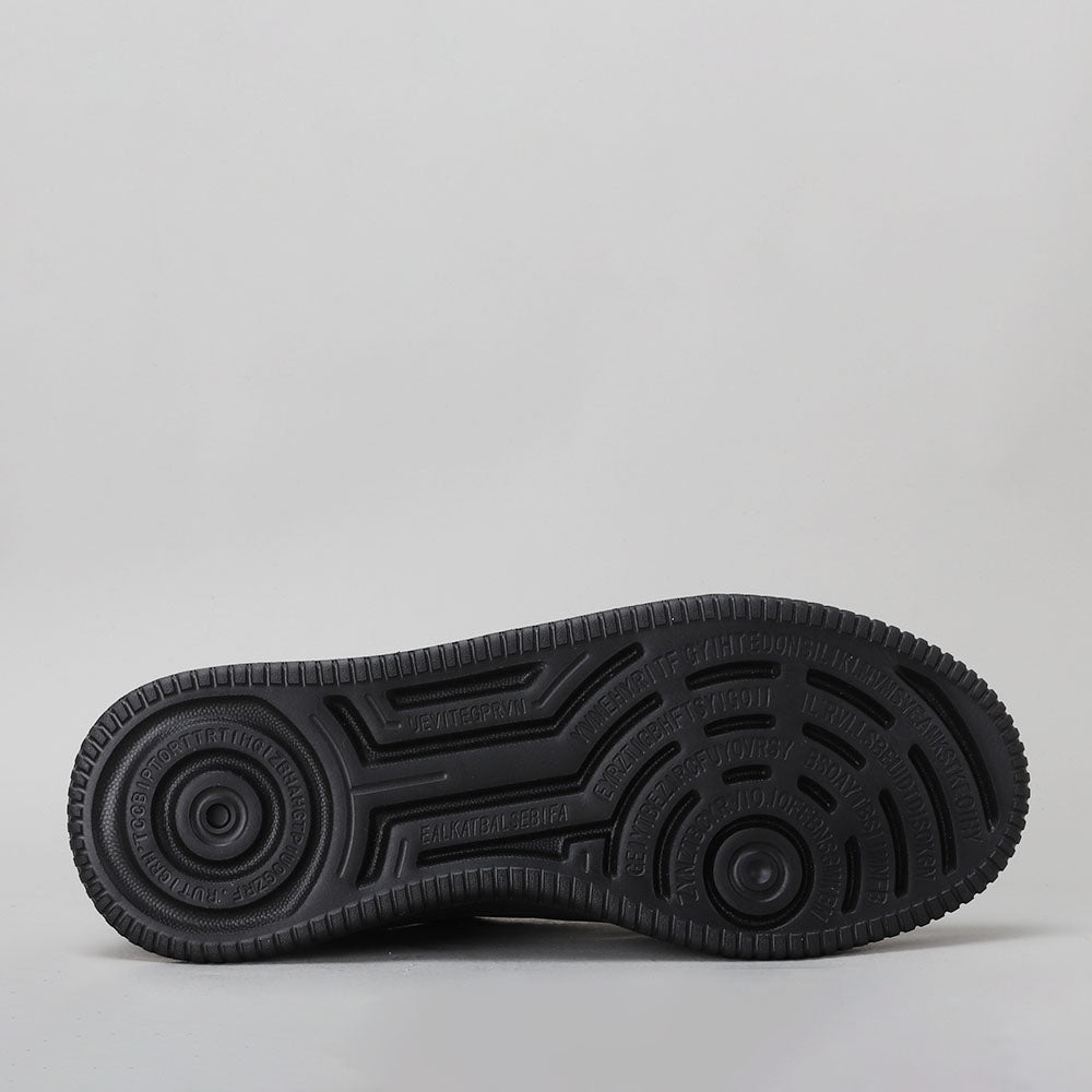 Naked Arches Nelly black sneakers with black laces and sole, showcasing a sleek, modern design and comfortable fit.