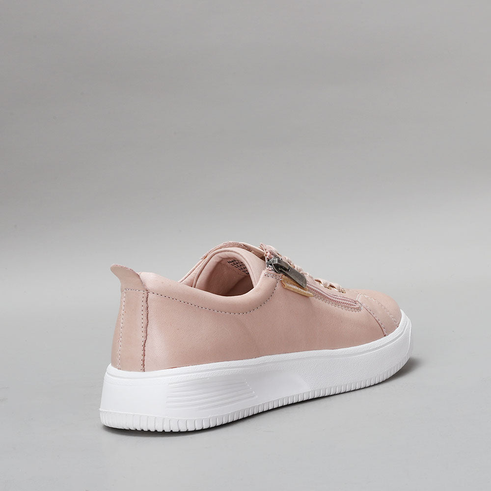 Naked Arches Nelly Blush sneakers featuring a soft blush pink color and stylish design, displayed on a neutral background.