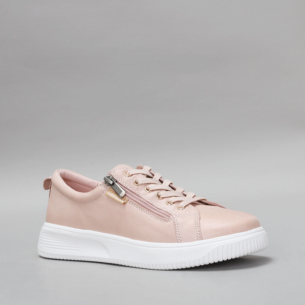Naked Arches Nelly Blush sneakers with soft pink fabric and white sole, stylish casual footwear for women.