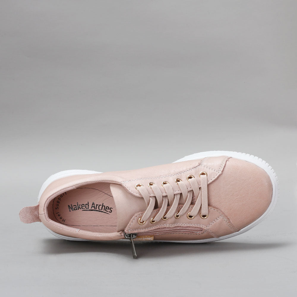 Naked Arches Nelly Blush sneakers with pink and beige design, featuring stylish laces and a comfortable rubber sole.