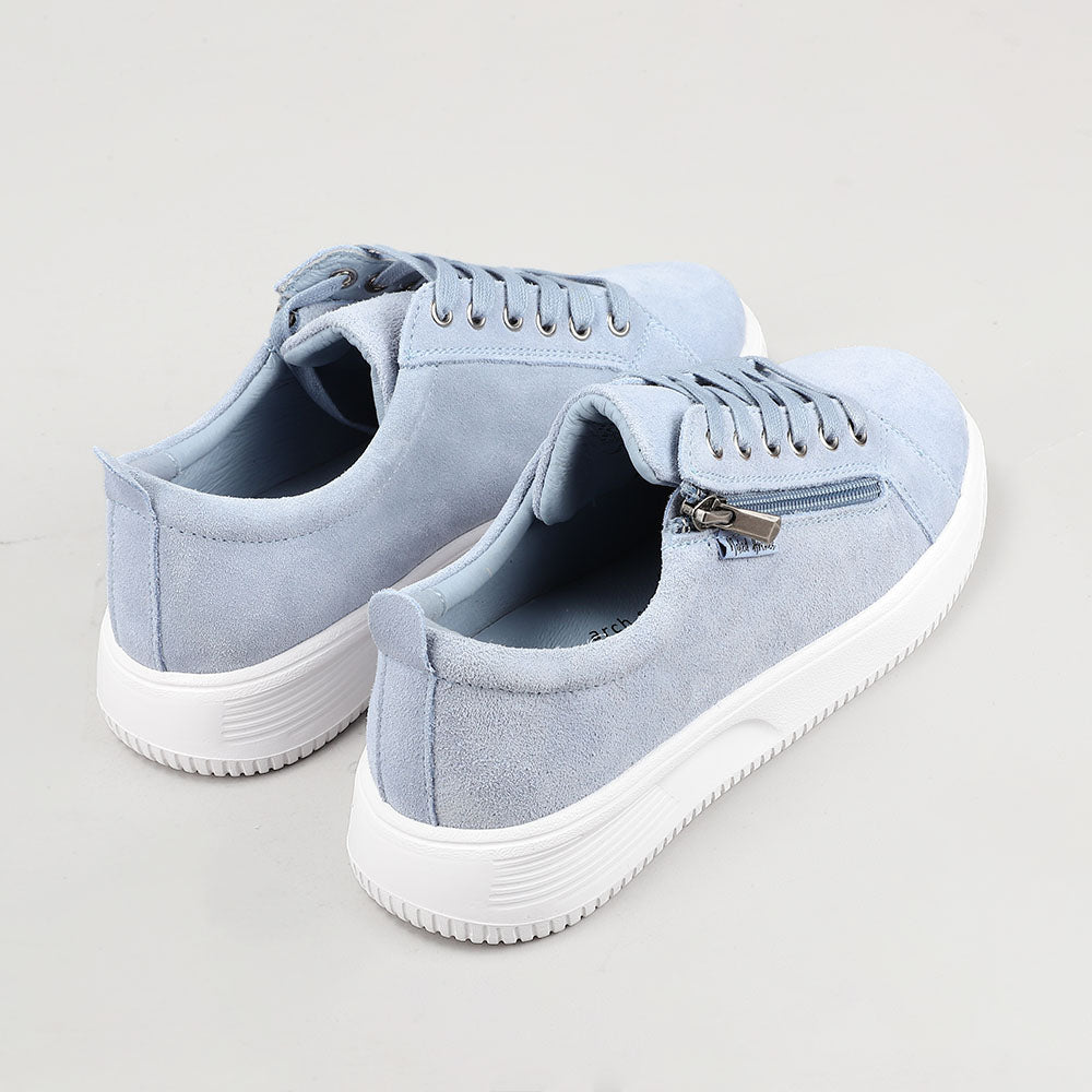 Naked Arches Nelly Denim sneakers featuring blue denim and suede accents, lace-up design, and white rubber soles.