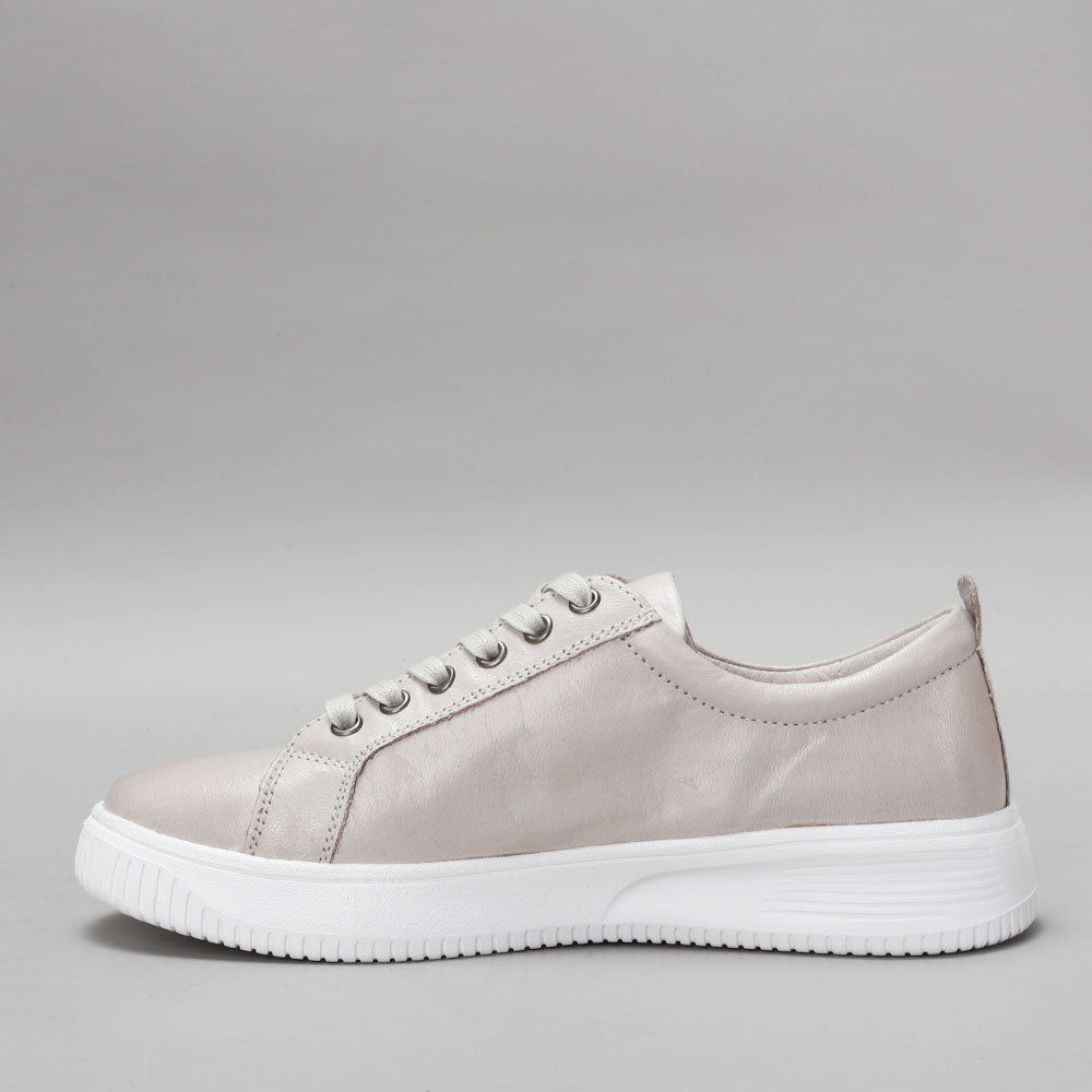 Naked Arches Nelly Silver Grey sneakers with sleek design and silver-grey color, featuring comfortable casual footwear.