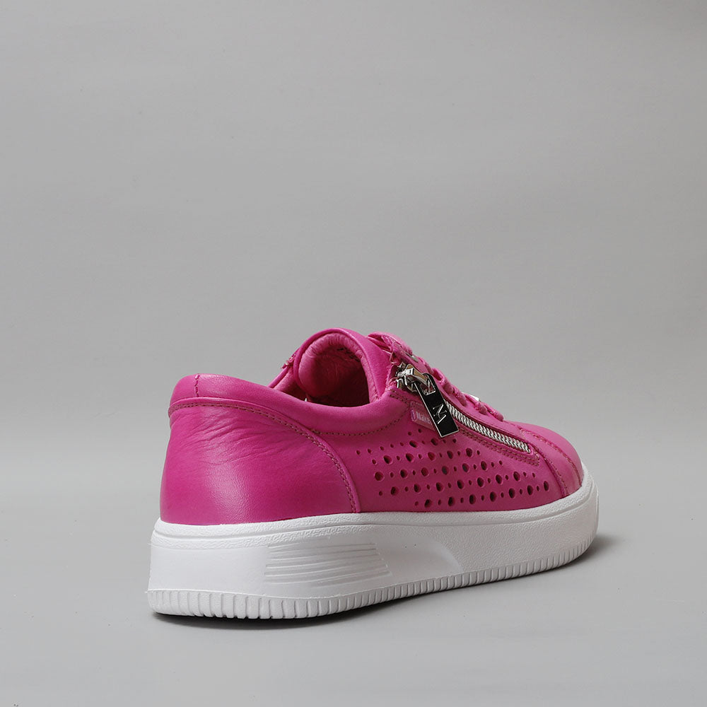 Naked Arches Noble Hot Pink sneakers with vibrant fuchsia color and sleek design, shown from a front view.
