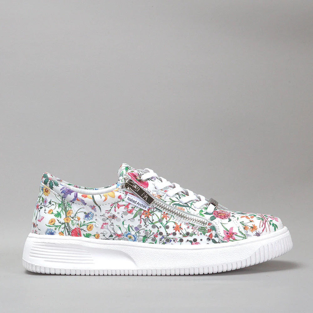 Naked Arches Noble White Floral sneakers showing a side view with white floral pattern on the canvas upper.