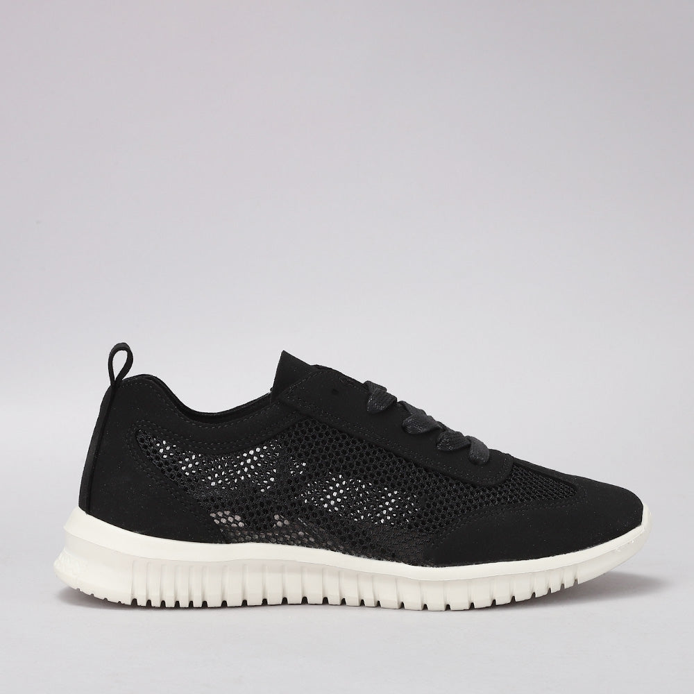 Black CC Resorts Oswald sneakers shown from the side, featuring a sleek design and casual style perfect for everyday wear.