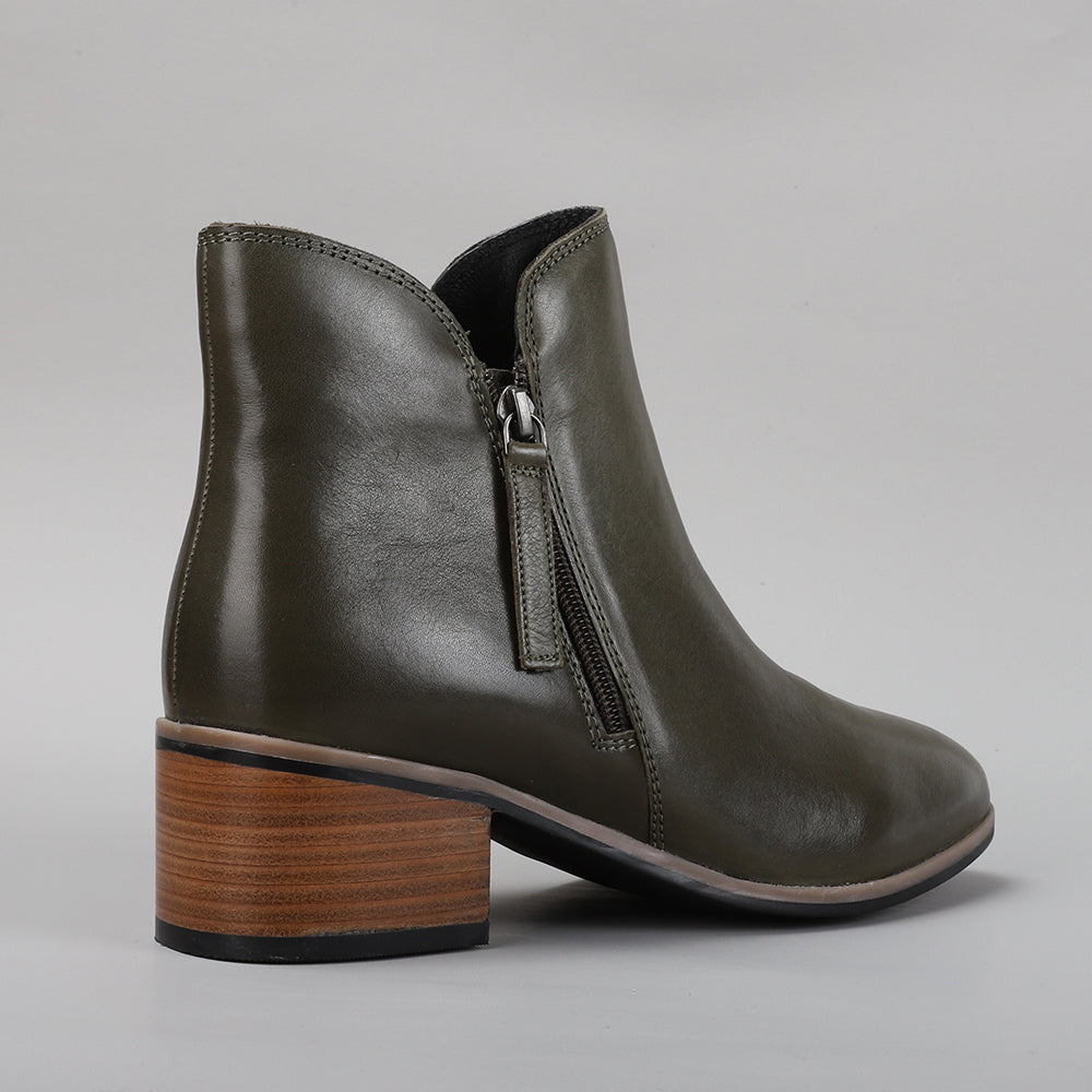 Le Sansa Oxley olive boots with laced design, ankle-high style, and rugged sole, showcased on a neutral background.
