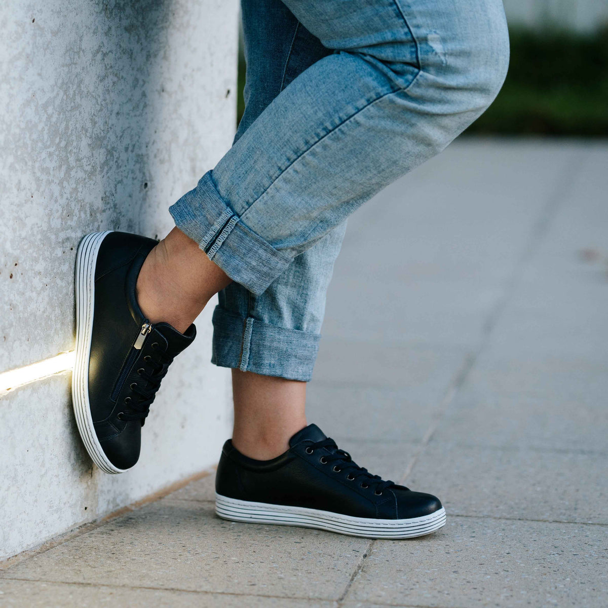 Black Cabello CABELLO UNITY sneakers featuring stylish design and comfortable fit, shown in a close-up view.