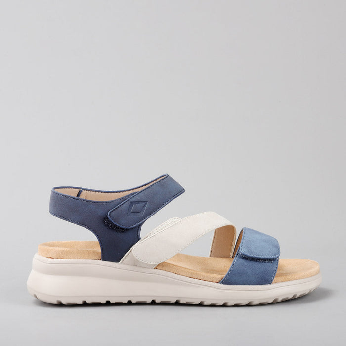 CC Resorts Pershing denim and off-white navy sandals with side view, featuring stylish straps and casual summer design.