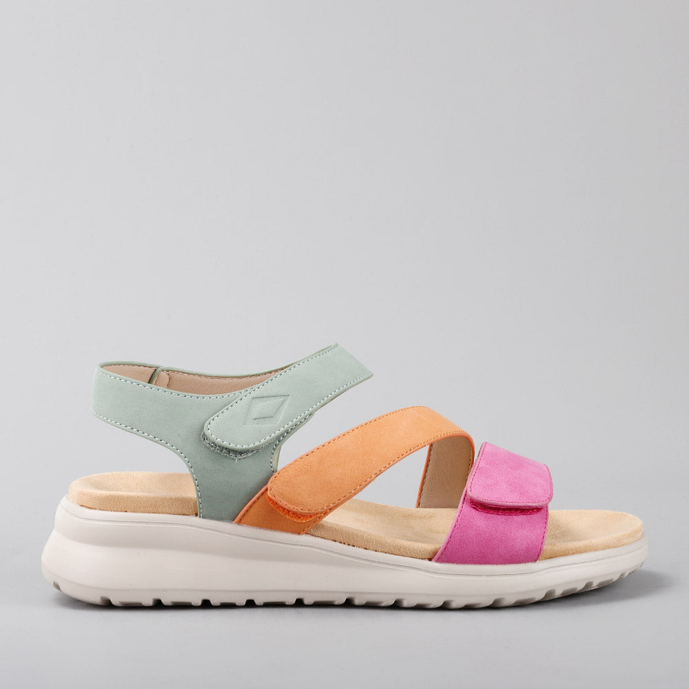 CC Resorts Pershing sandals in fuchsia, tan, and sage with side view, featuring stylish straps and comfortable design.