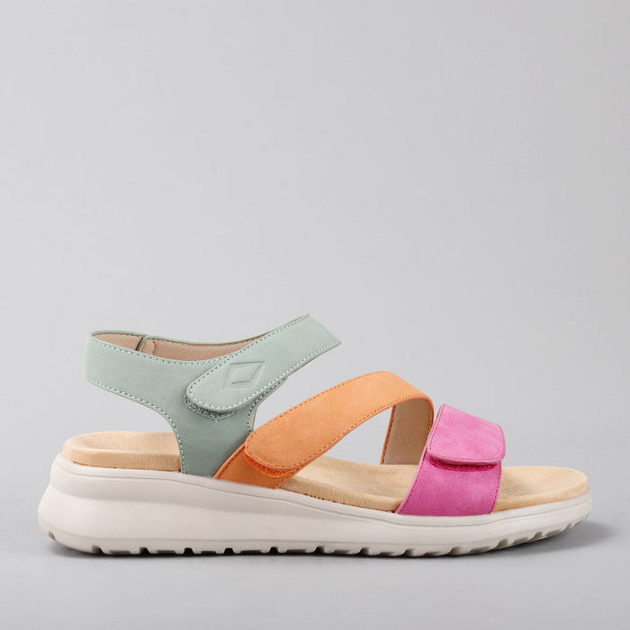 CC Resorts Pershing sandals in fuchsia, tan, and sage with side view, featuring stylish straps and comfortable design.