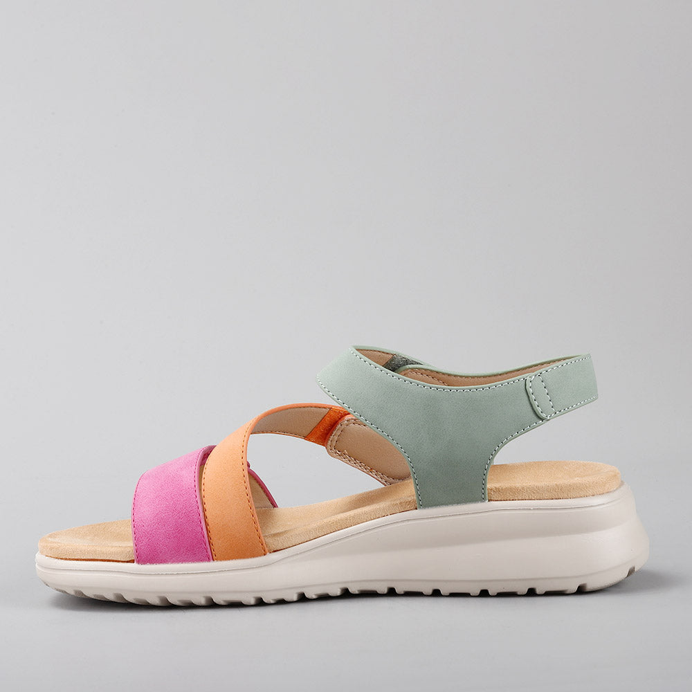 CC Resorts Pershing sandals in fuchsia, tan, and sage with woven straps, stylish and comfortable for warm-weather wear.
