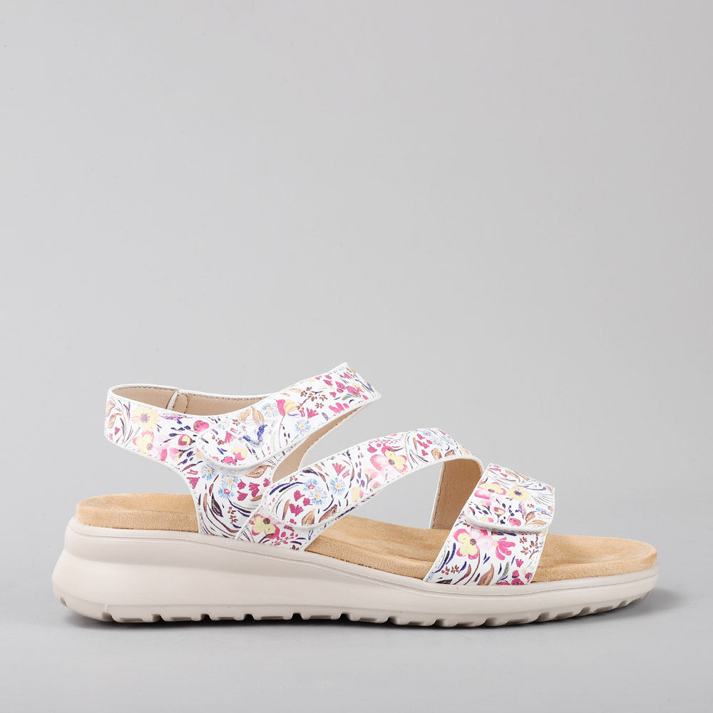 CC Resorts Pershing white floral sandals with ankle straps and open-toe design, perfect for casual summer wear.