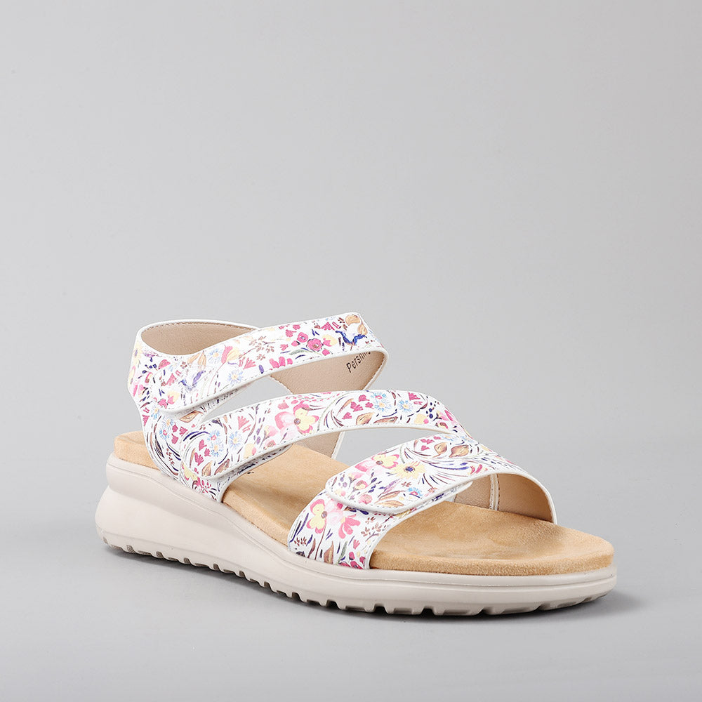 CC Resorts Pershing white floral sandals with delicate floral straps and open-toe design, perfect for summer wear.