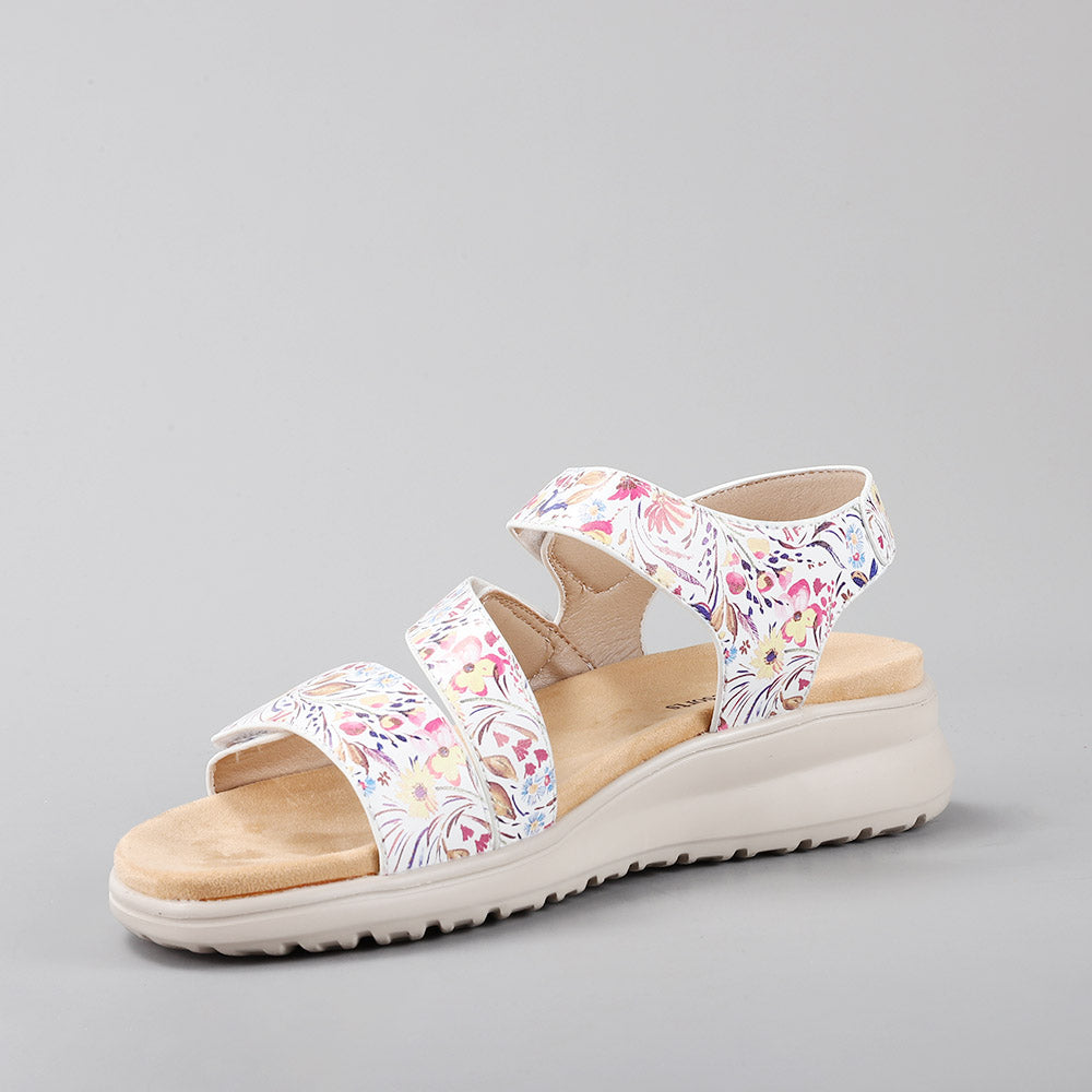 CC Resorts Pershing white floral sandals with intricate southwest-inspired design and comfortable slip-on style.