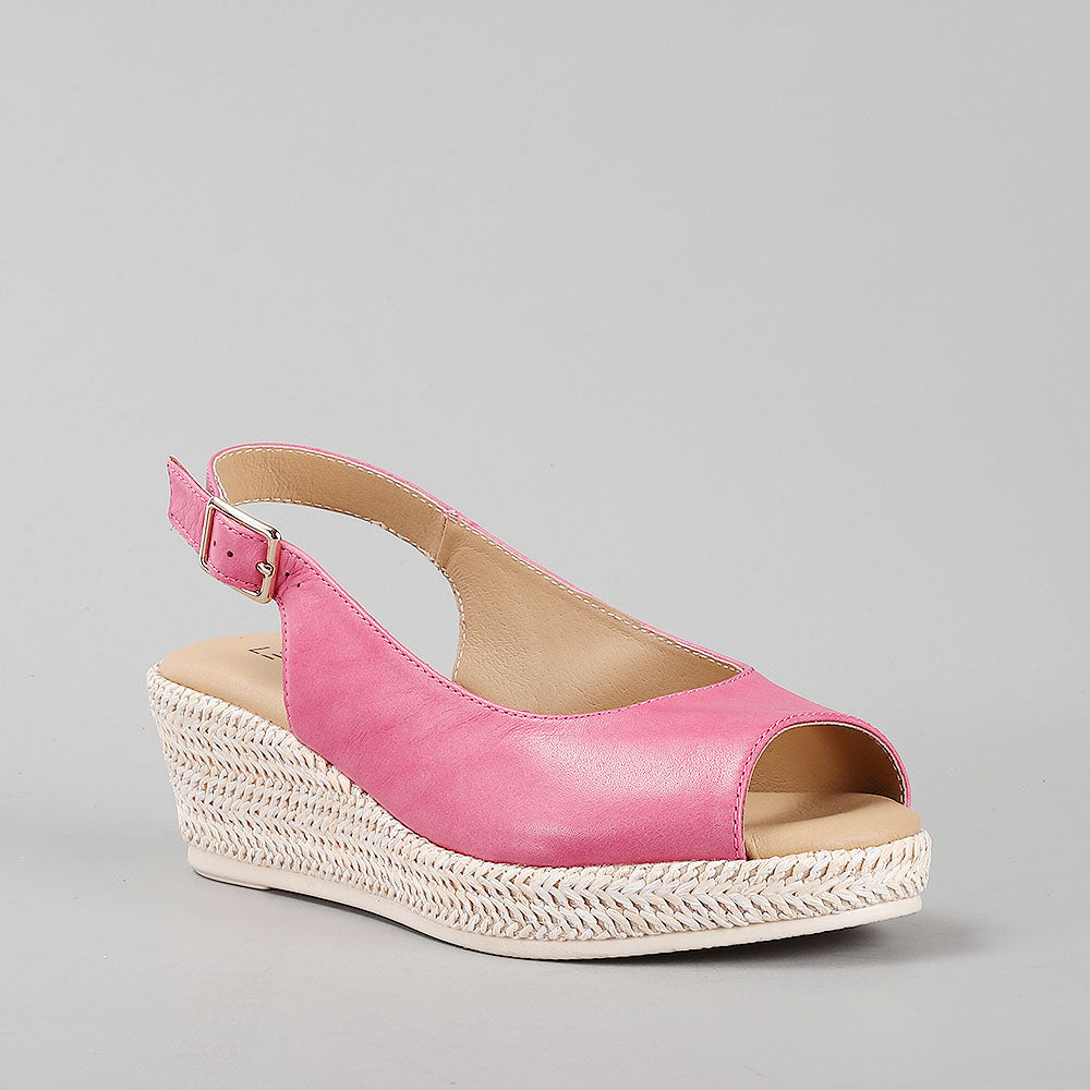Le Sansa Petunia Hair sandals with beige straps and flat sole, stylishly designed for casual summer wear.