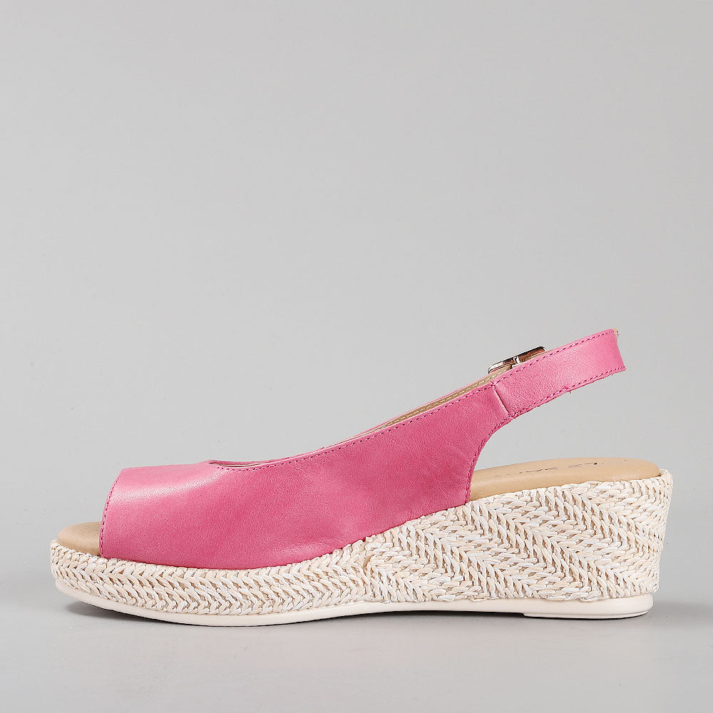 Le Sansa Petunia Hair sandals with beige straps and flat soles, designed for casual summer wear.