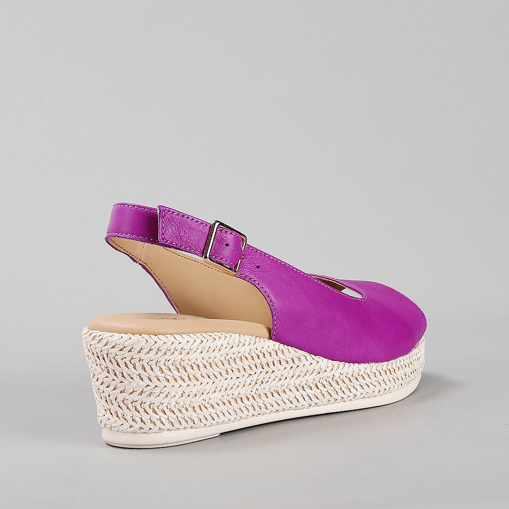 Le Sansa Petunia purple sandals with open toe design and ankle strap, stylish footwear for casual wear.