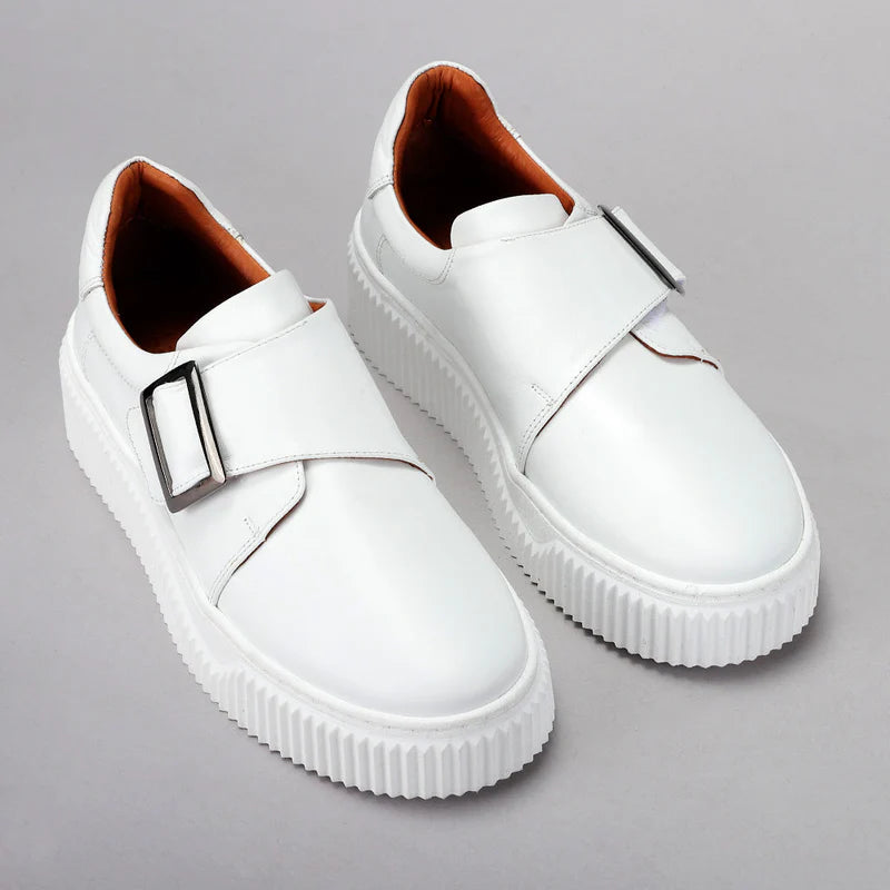 Pair of white Le Sansa Philia sneakers with clean design and comfortable fit, shown from a side view.