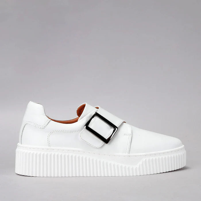 Le Sansa Philia white sneakers with a sleek design and white laces, showcasing a stylish casual footwear look.