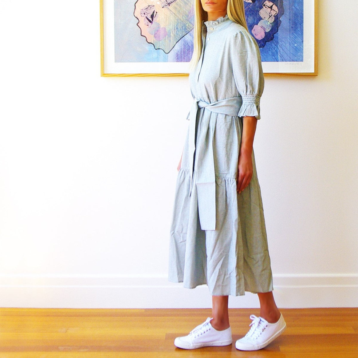 White Lottie dress in sage green from Who's Charlie, featuring a stylish, flowy design perfect for casual or semi-formal wear.