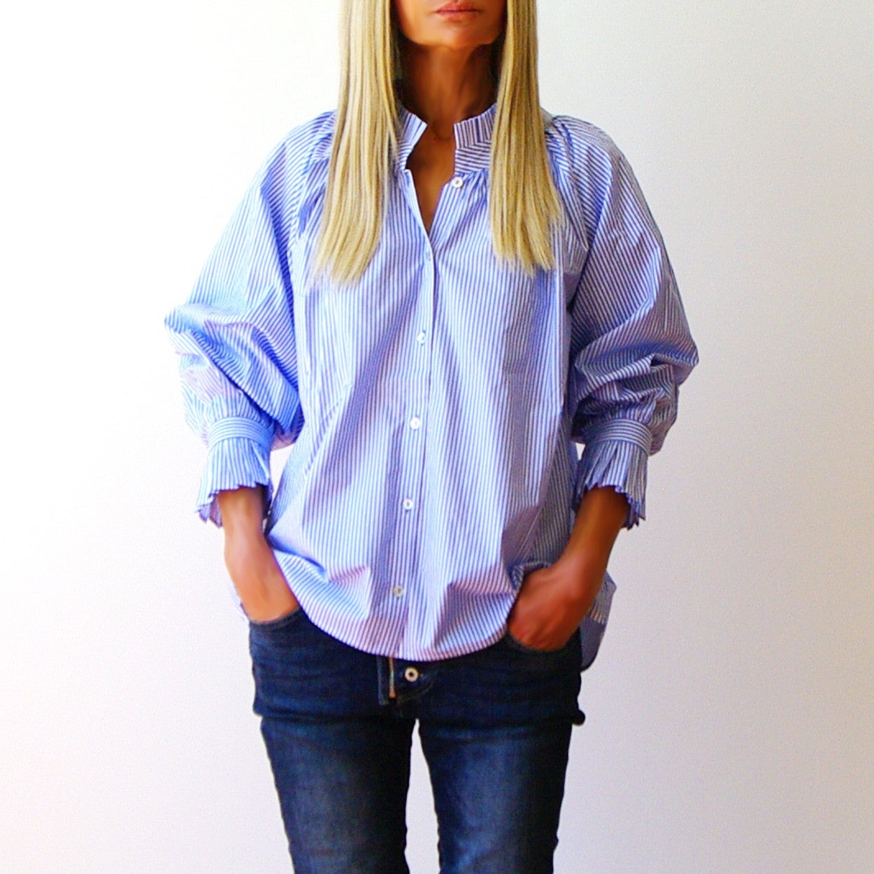 Who's Charlie olive and white blouse featuring a classic fit, stylish collar, and button-front design.