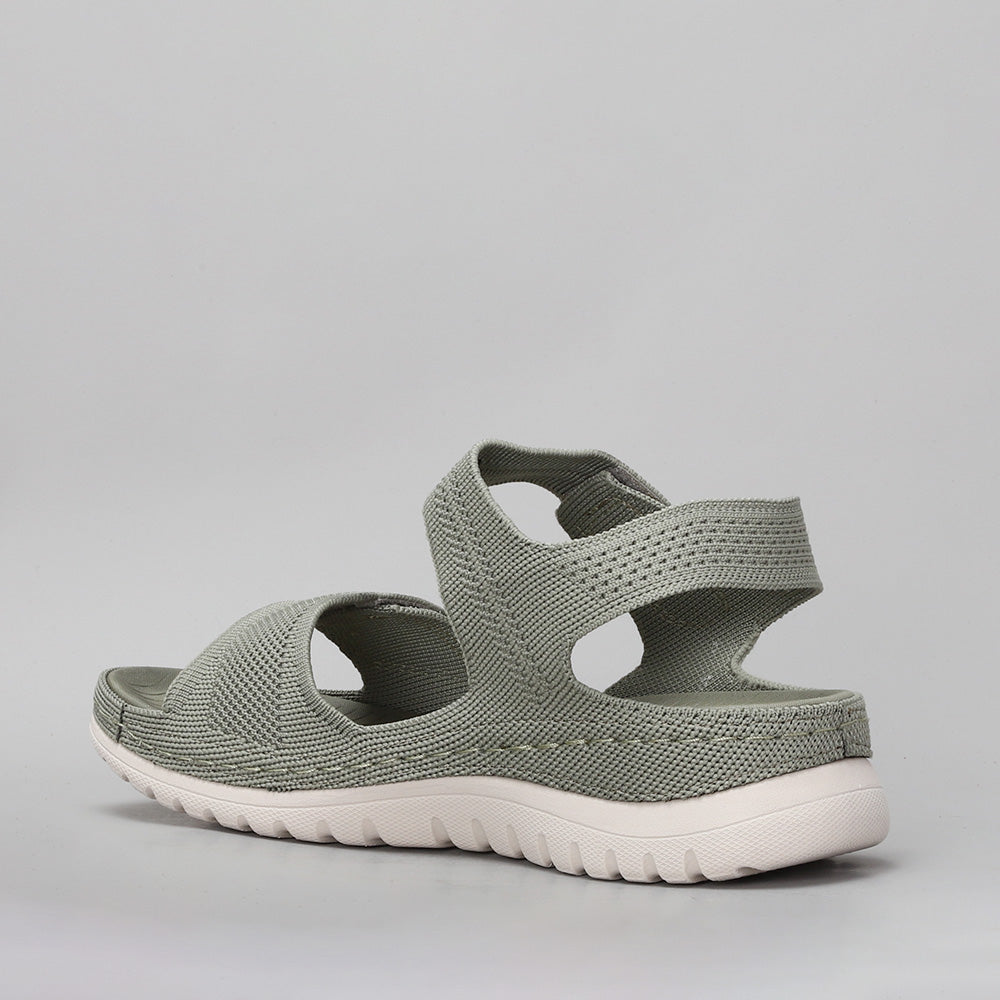 CC Resorts Ram Khaki sandals featuring open-toe design and cushioned straps, displayed on a neutral background.