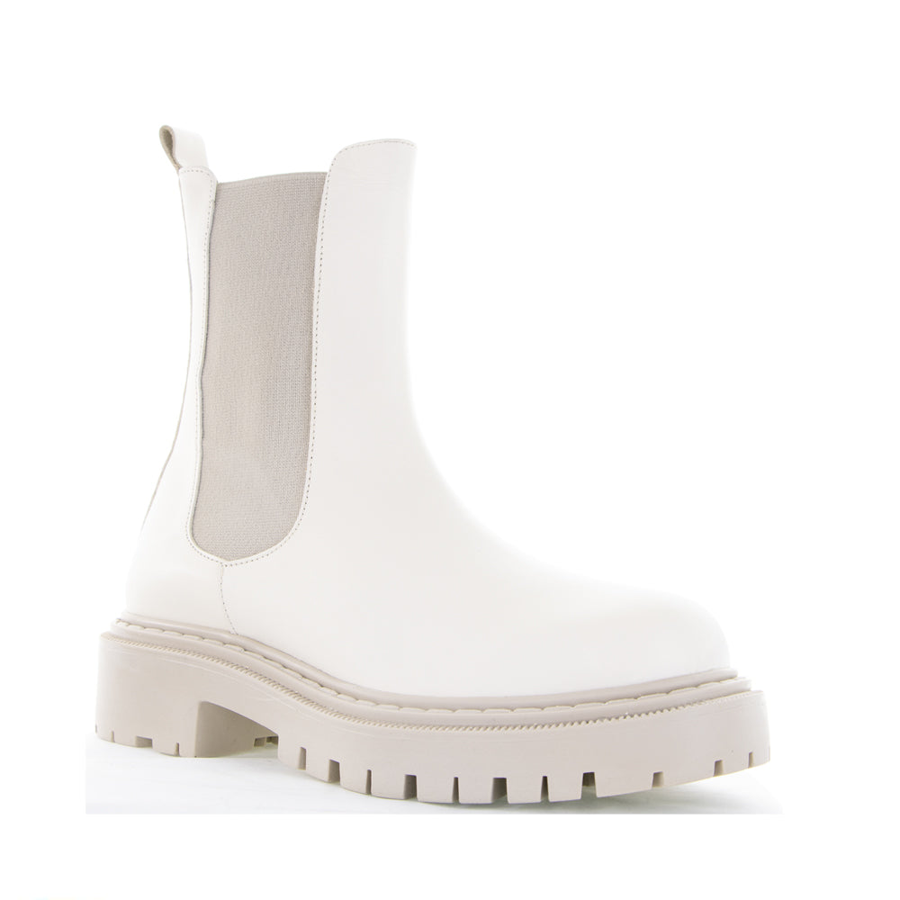 Le Sansa Rebecca Vanilla boots, stylish ankle boots with a sleek design and neutral color, perfect for versatile fashion looks.