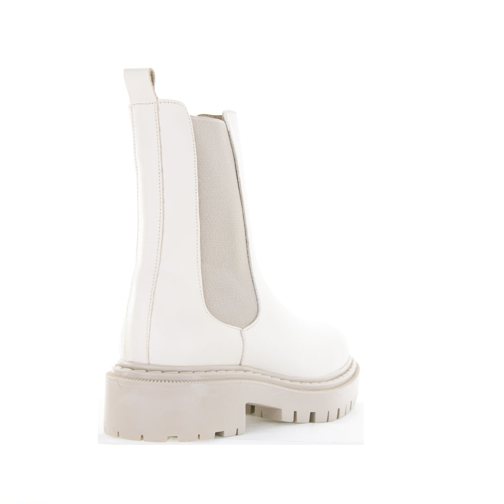 Le Sansa Rebecca Vanilla boots with beige suede material and ankle-high design, featuring stylish stitching and comfortable fit.
